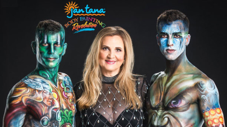 Jan Tana with two people fully covered in body paint.